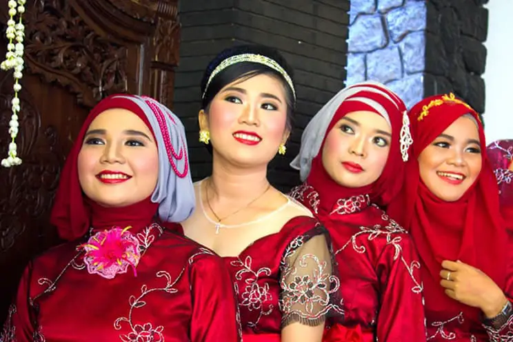 Muslim bridesmaids lined up a wedding