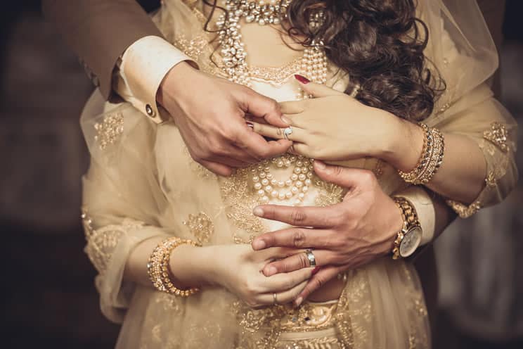 Couple wearing rings